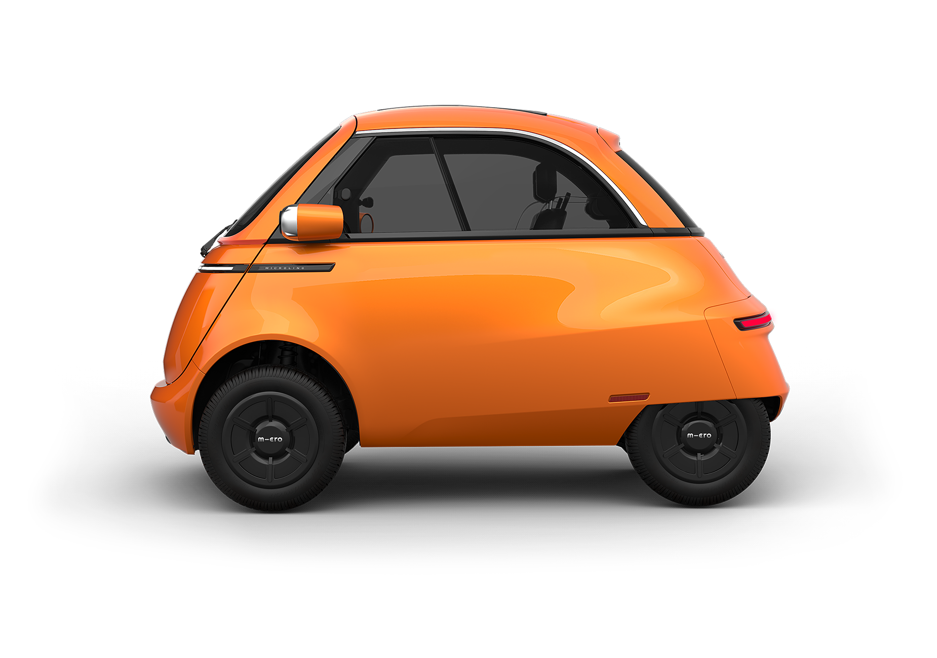 Seitenansicht des Microlino E-Auto in orange